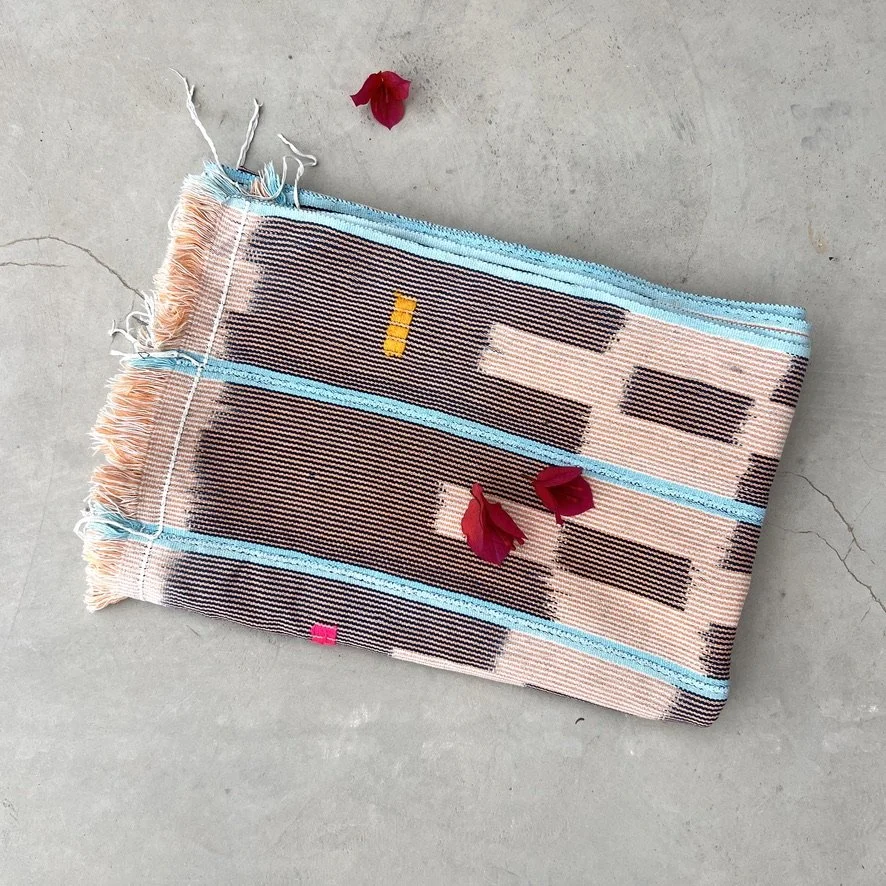 Baoulé blanket aqua stripes on salmon folded main