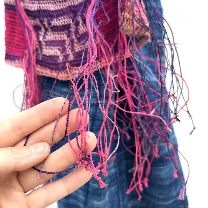 Pink Madang Bilum bag with fringe closeup 1