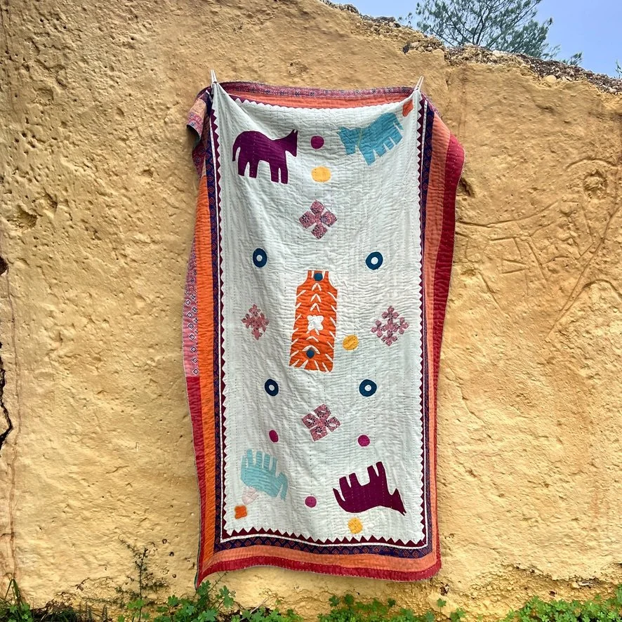 Animal Sindhi ralli quilt Barmer on yellow wall