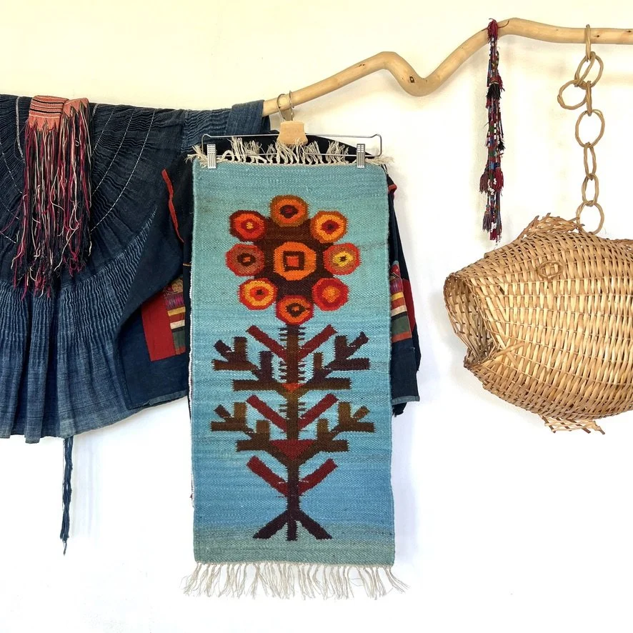 Polish abstract 70s flower tapestry in living room