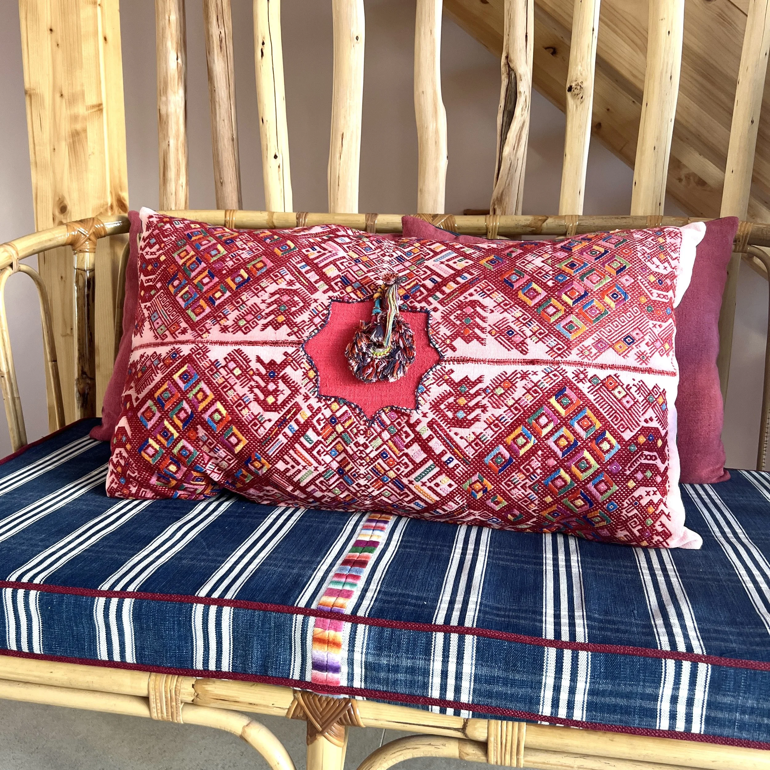 Nahualá huipil cushion cover with hemp back side on sofa 2