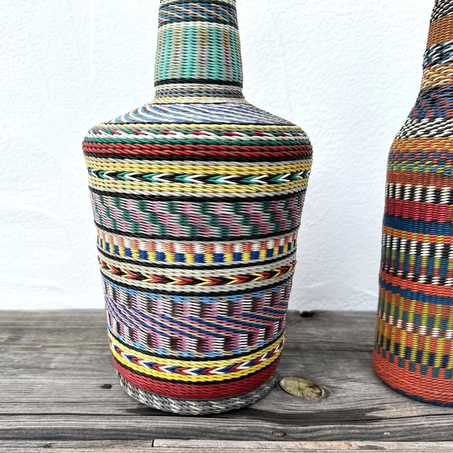 Wire-wrapped miner's bottle with other bottle