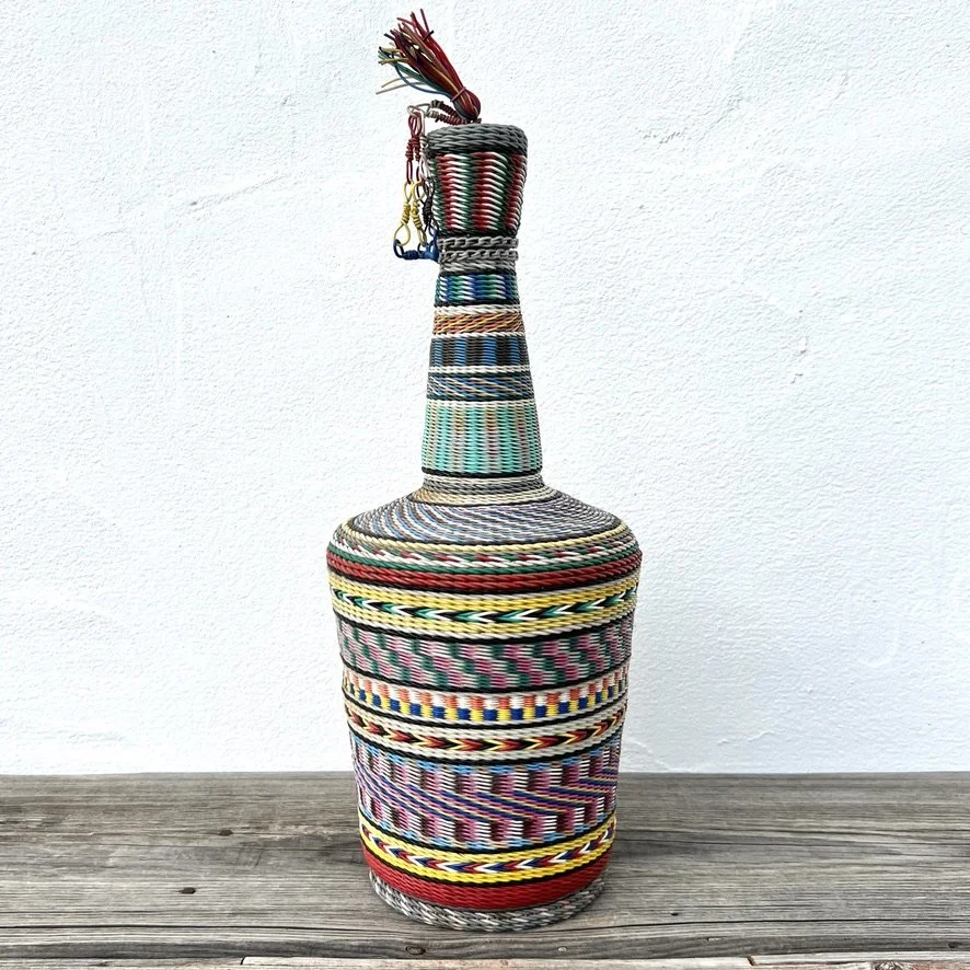 Wire-wrapped miner's bottle main