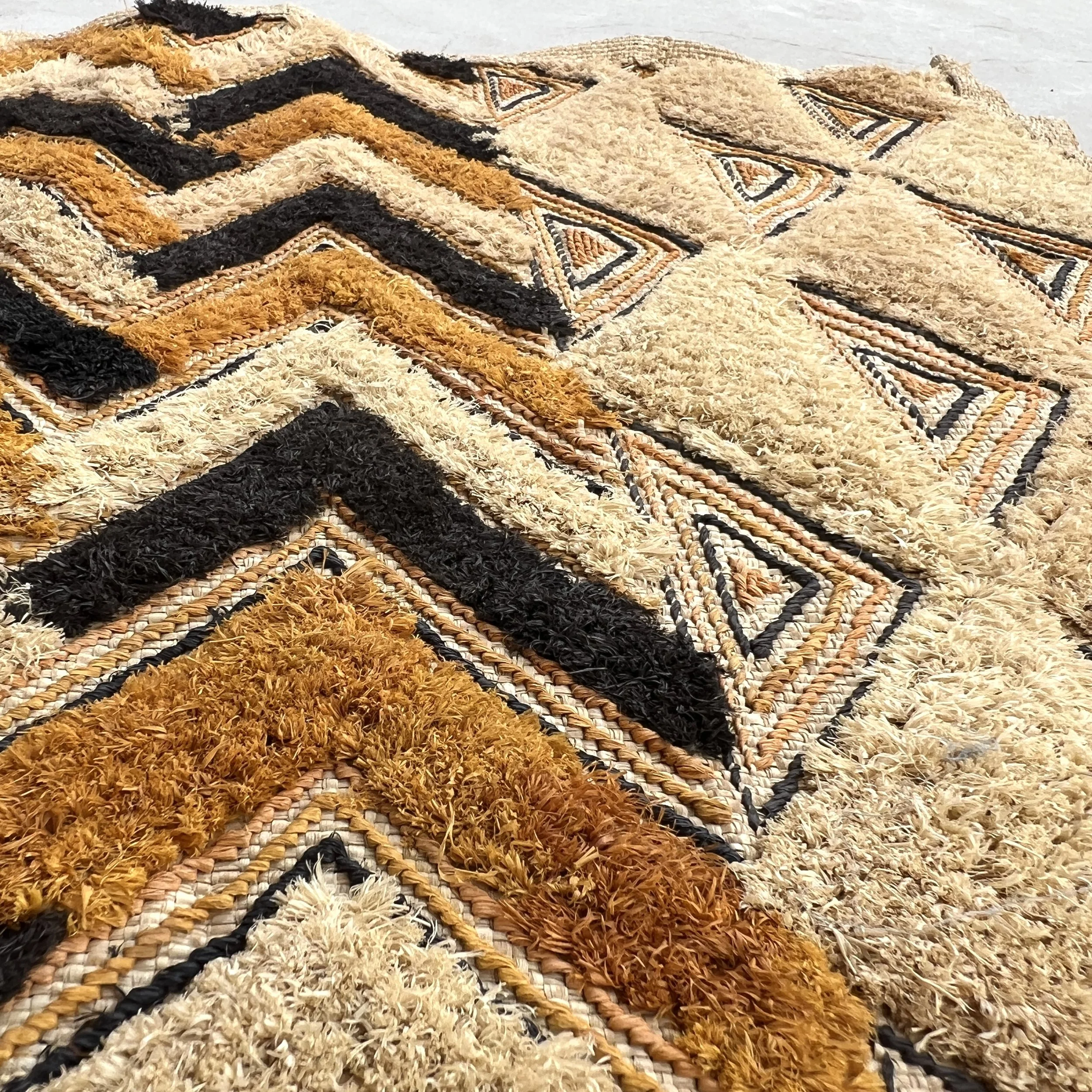Kuba cloth pile triangles diagonal view