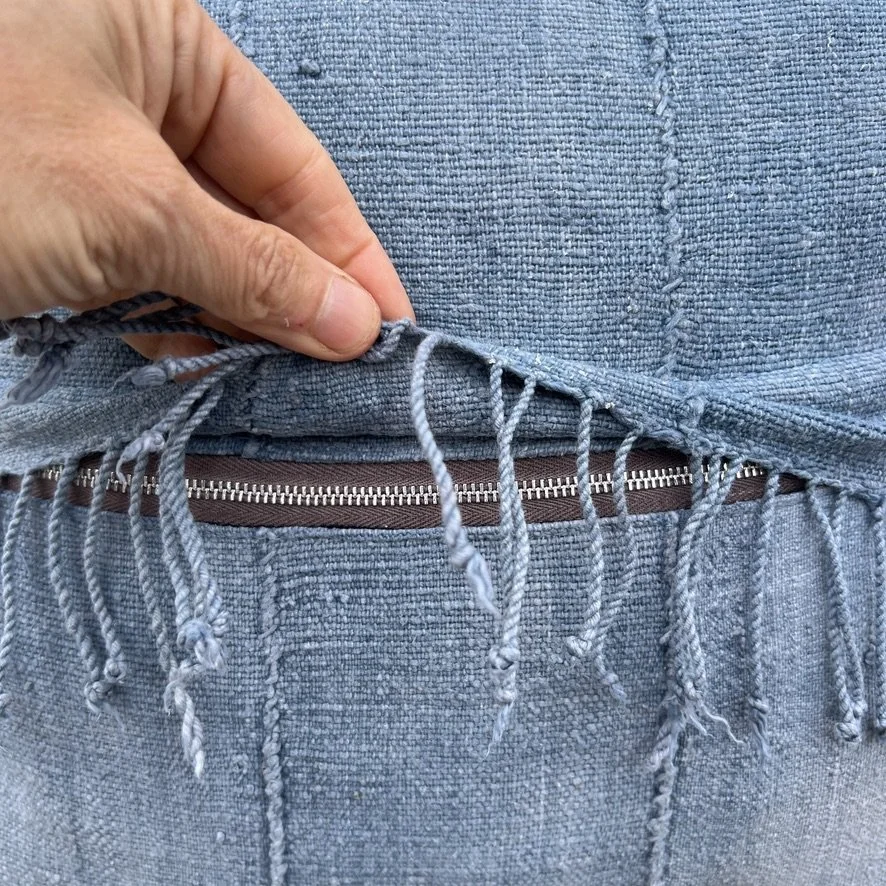 Mali mud cloth cushion cover animal motif closeup zipper