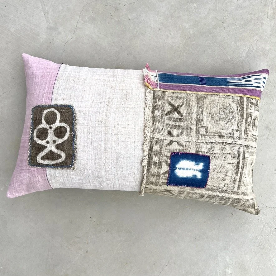 Mud cloth patchwork lumbar cushion cover on floor