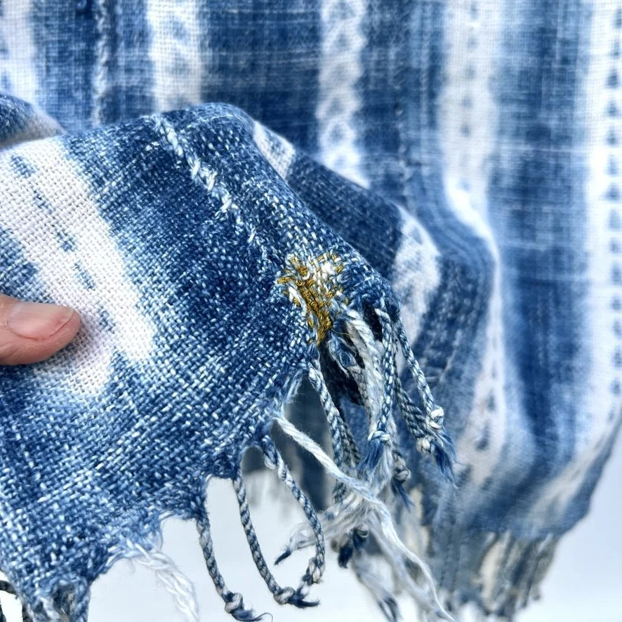 Vintage indigo scarf resist dye mustard thread closeup 1