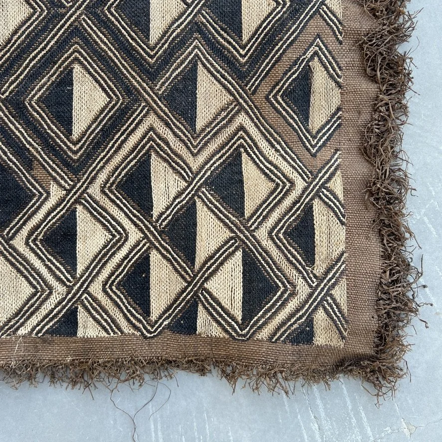 Square Kuba cloth from Kongo with geometrical pattern closeup corner