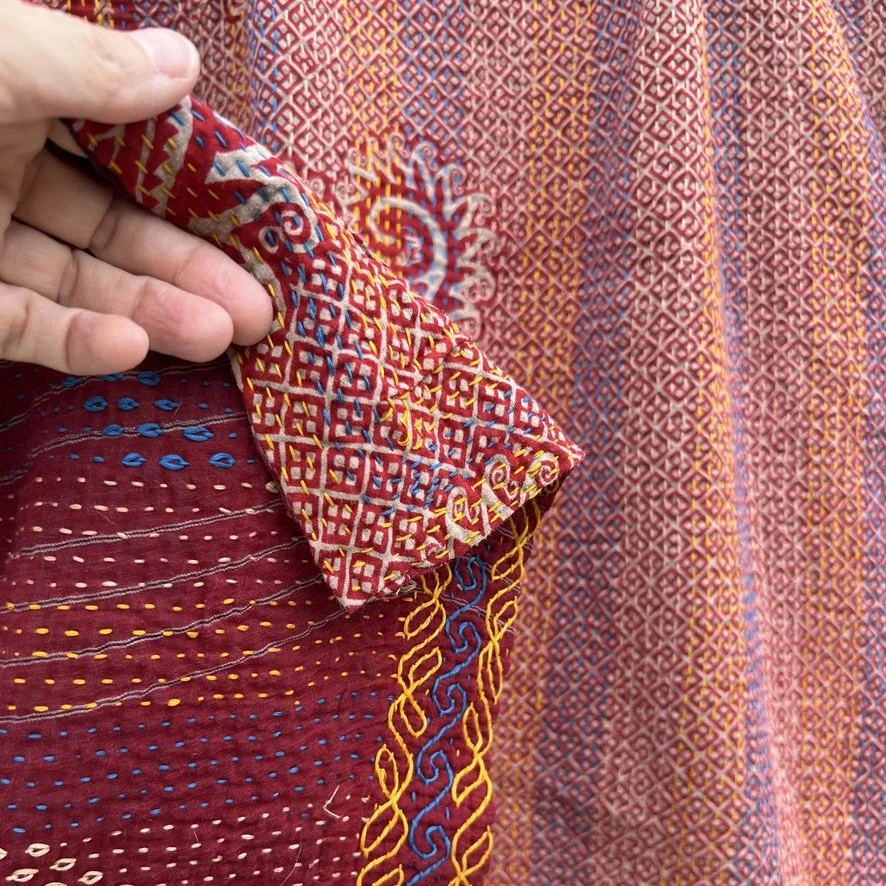 Large Kantha blanket Bangladesh Fair Trade burgundy hand-embroidered closeup reverse