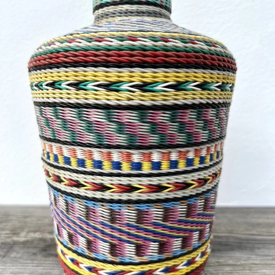 Wire-wrapped miner's bottle closeup