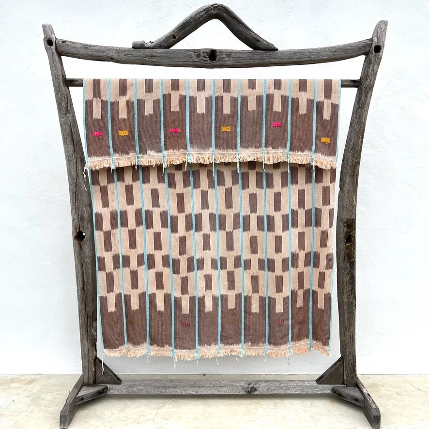 Baoulé blanket aqua stripes on salmon hanging