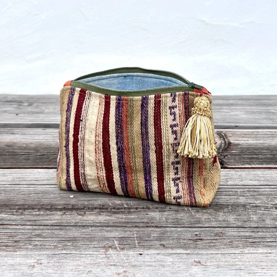 White Thai pouch slightly open