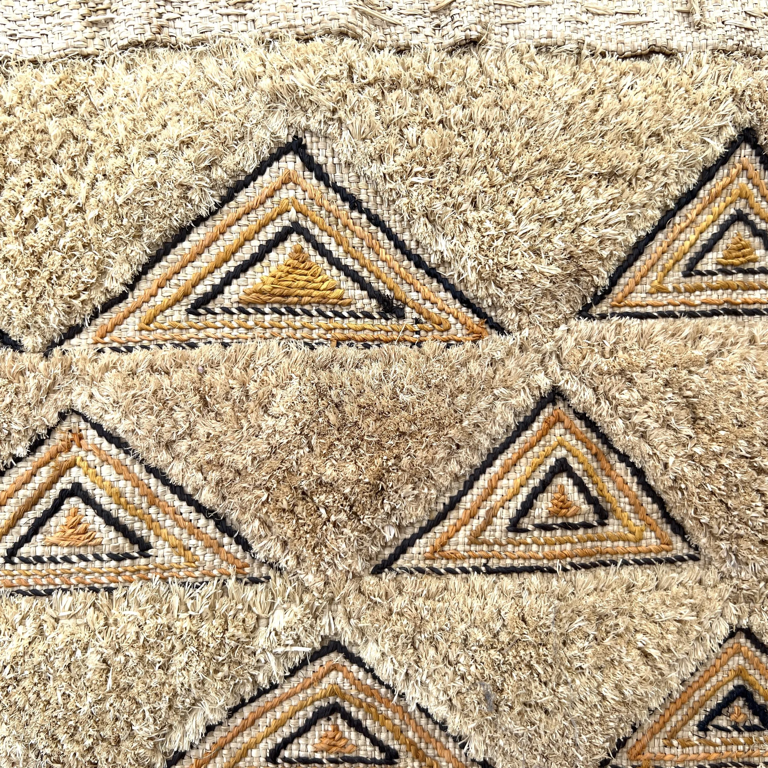 Kuba cloth pile triangles closeup