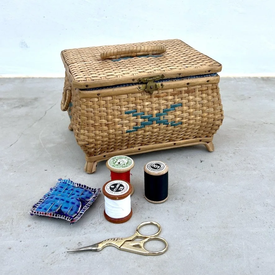 small vintage rattan sewing basket with sewing accessories main