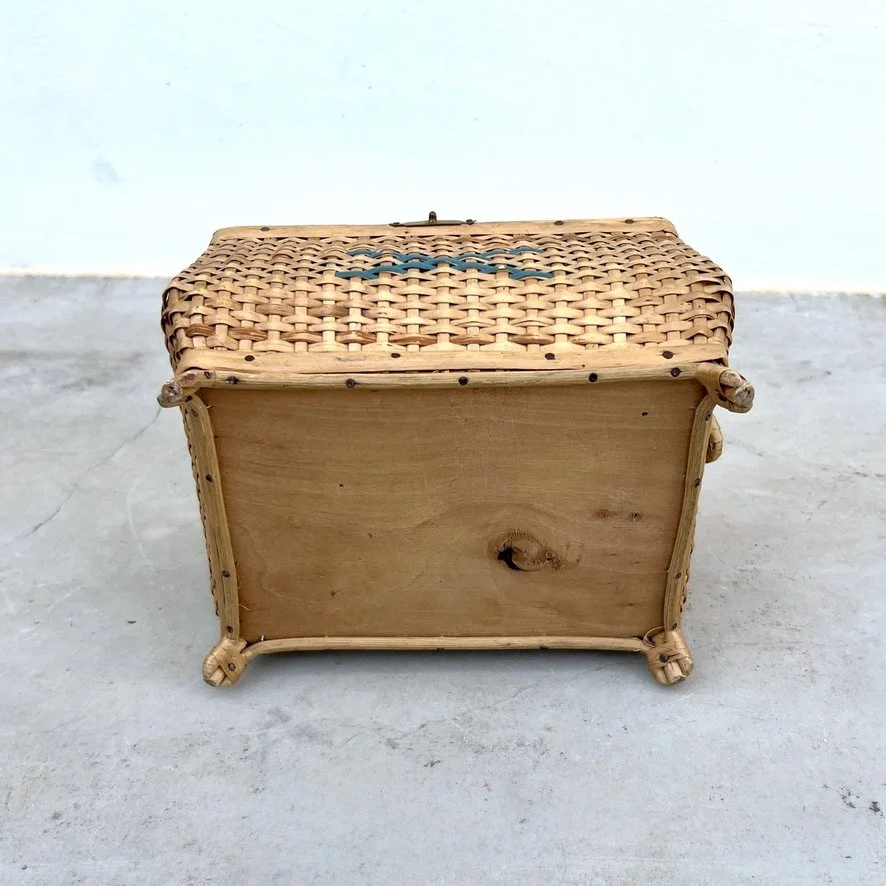 small vintage rattan sewing basket with sewing accessories bottom