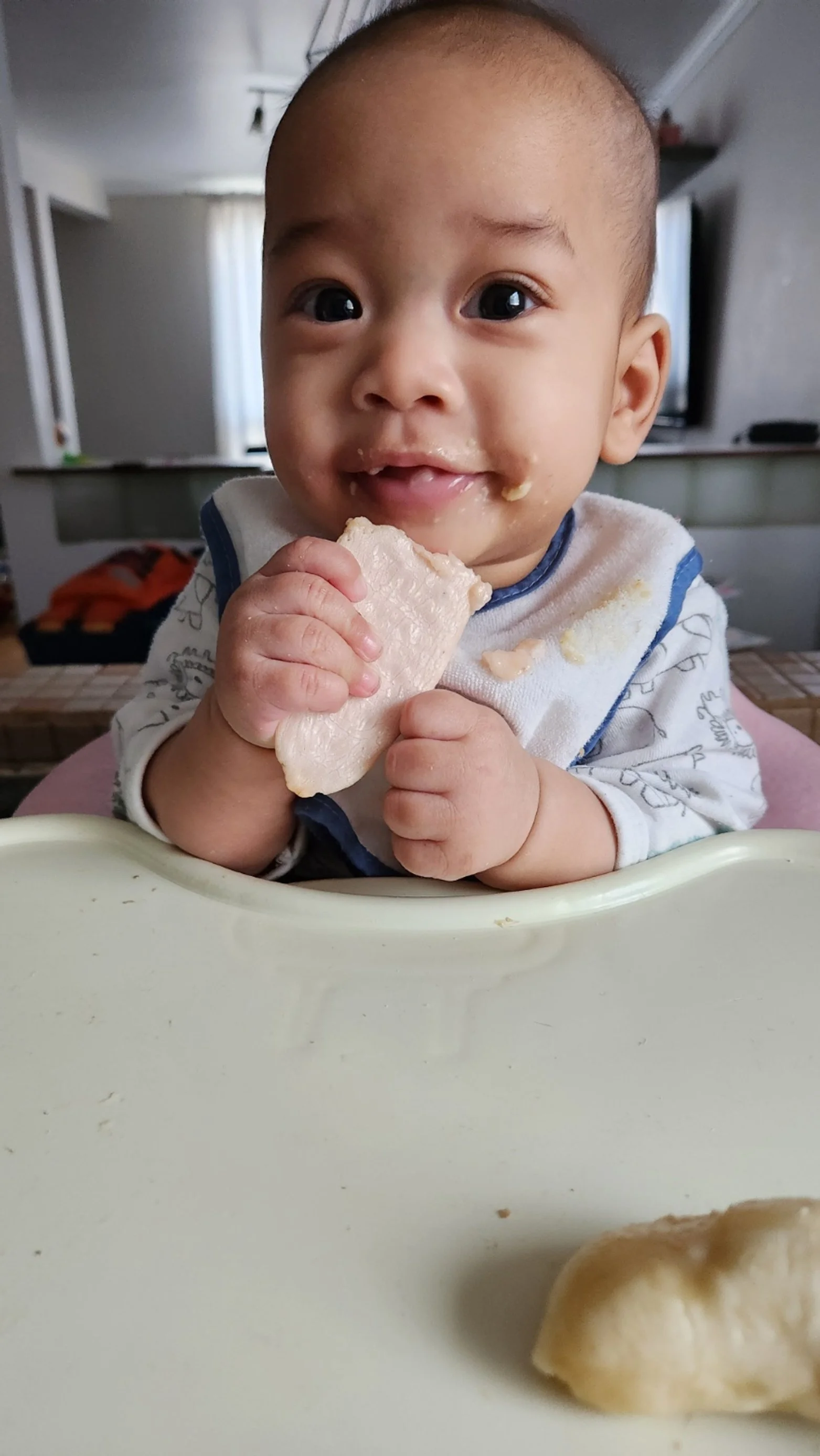 Snacking is always an activity babies enjoy.