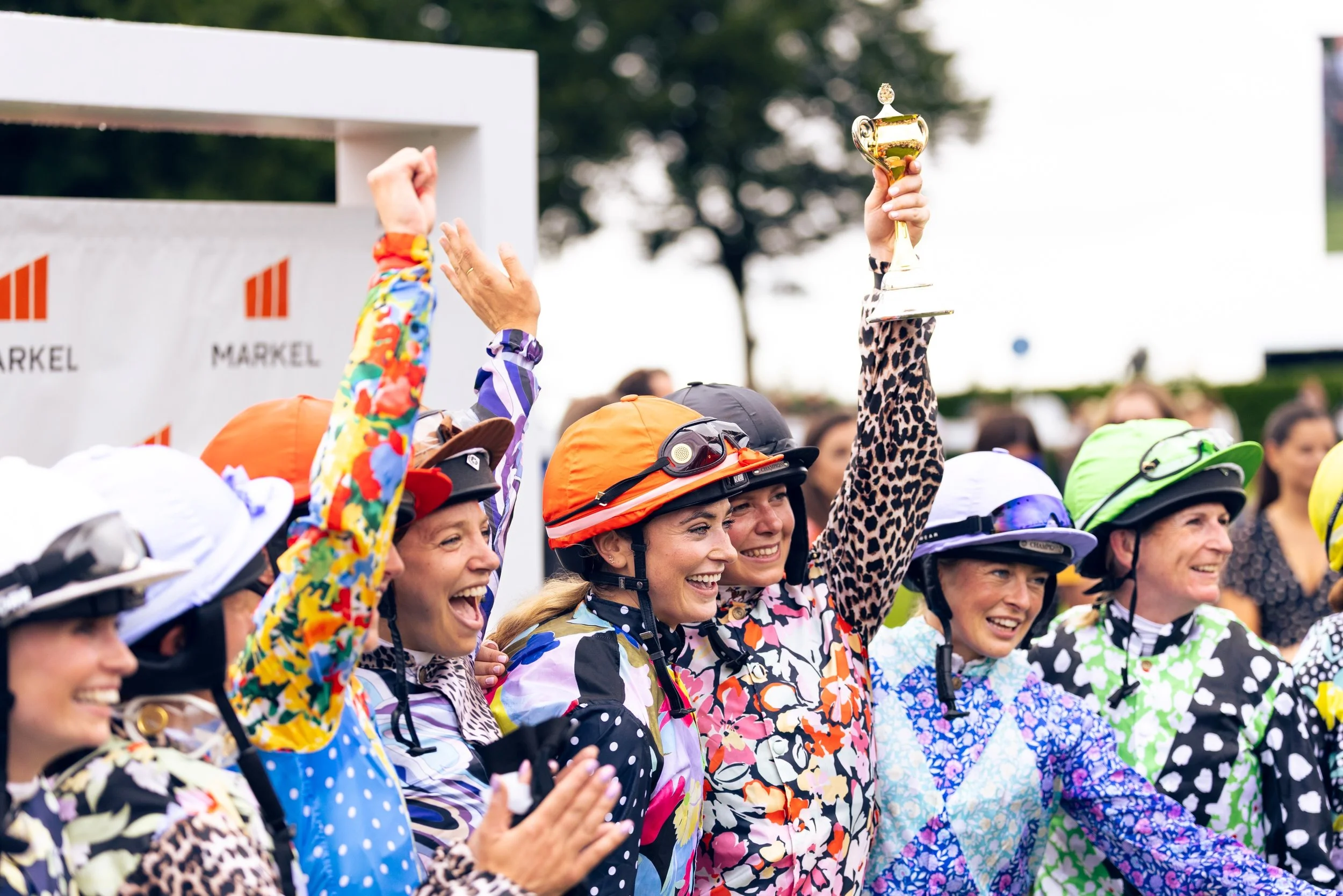 Sophie Forsyth wins the Markel Magnolia Cup in RIXO designed racing silks Ph. by Jason Fong.jpg