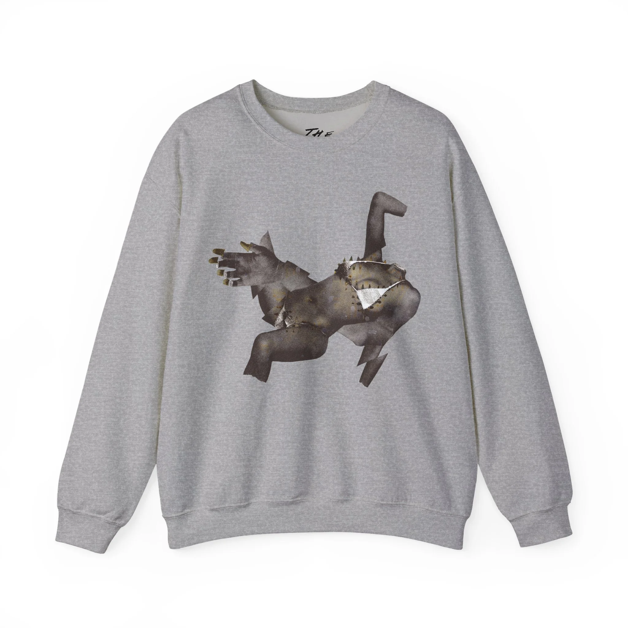 "A gray unisex heavy-blend crewneck sweatshirt featuring a surrealist mixed-media collage design of a fragmented female figure in a dynamic, expressive pose."