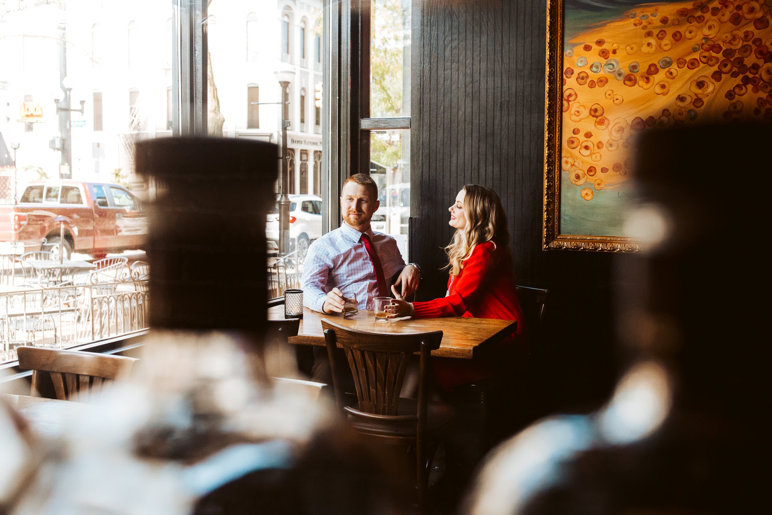 ©TonyaMerkePhotography-EngagmentPhotographer-MichiganEngagement-AnnArborEngagement-TheRaven-BW-CoupleSnuggling-CoupleinWindow-DateNight-CoupleinLove.jpg