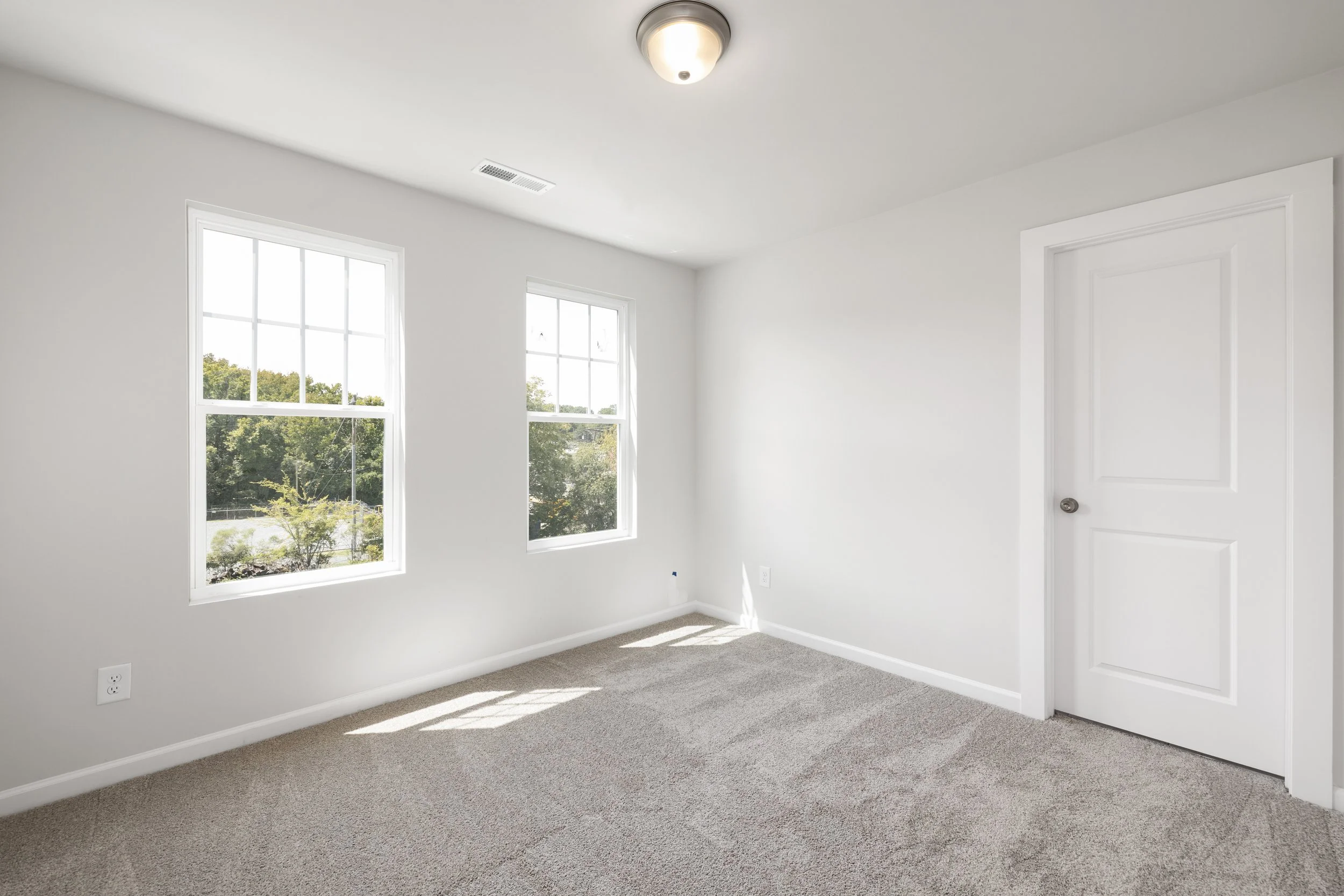 13-duplex secondary bedroom.jpg