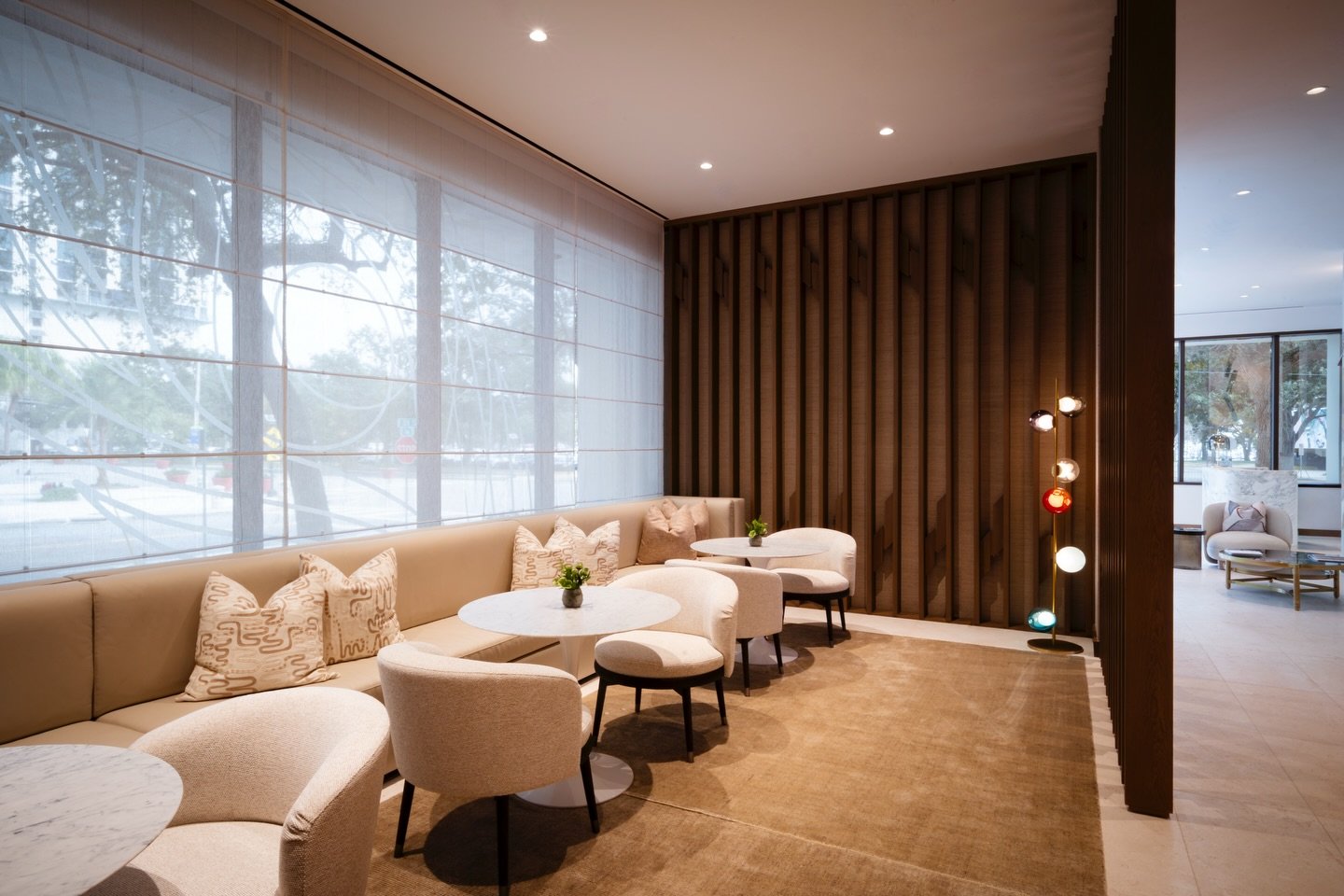 Custom fabricated wall paneling and dividers for the Waldorf Astoria Sales Center in St. Petersburg, FL. 

Crafted from matching white oak with geometric detailing, we ensured a seamless finish throughout the space. Our team delivered the full suite 