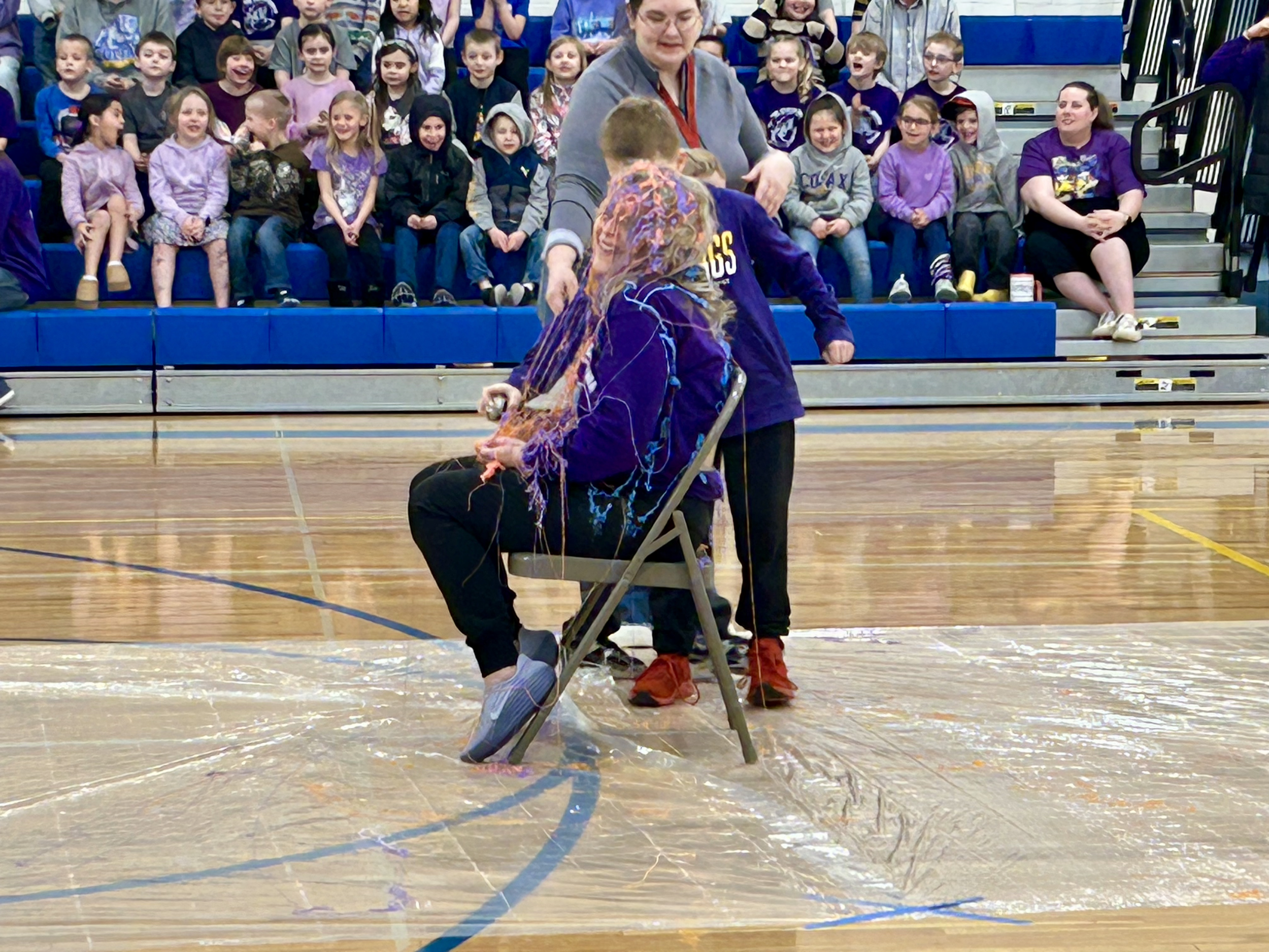 Mrs. Soncarty's class won the 2026 Money War for the upper hall and chose to silly string their own teacher!