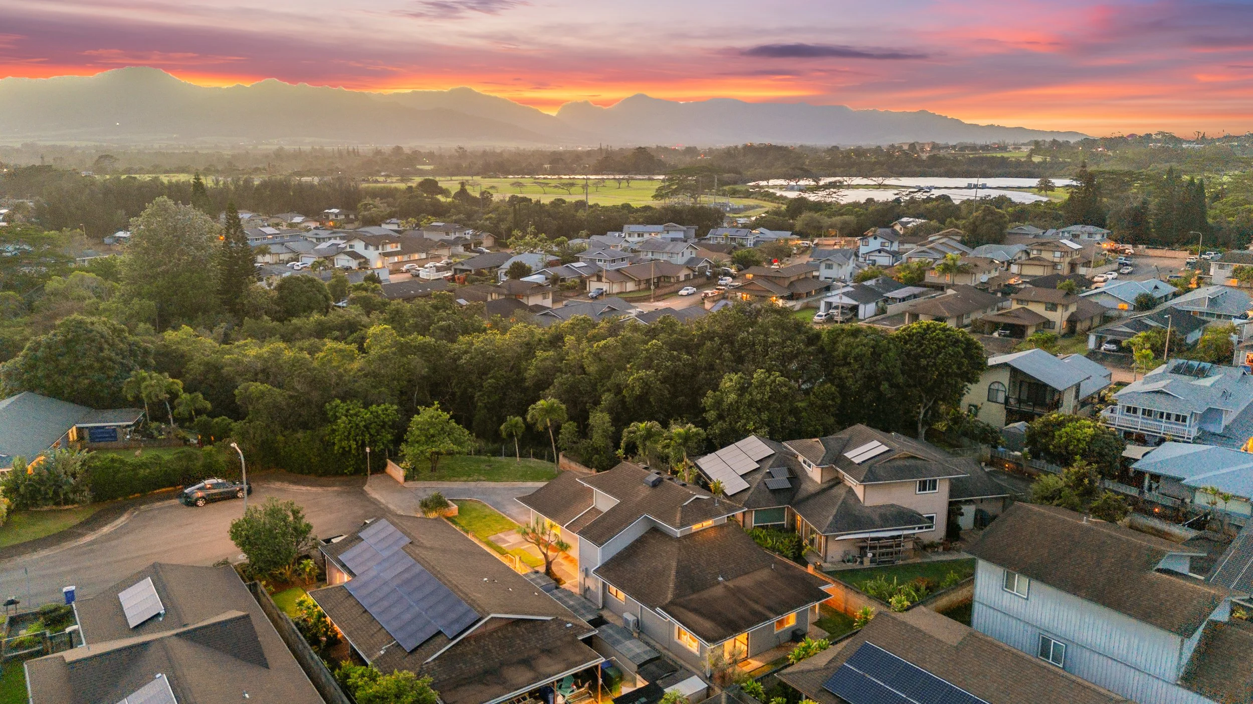 Aerial sunset view of Mililani Hawaii neighborhood with Waianae Mountains - Mililani real estate