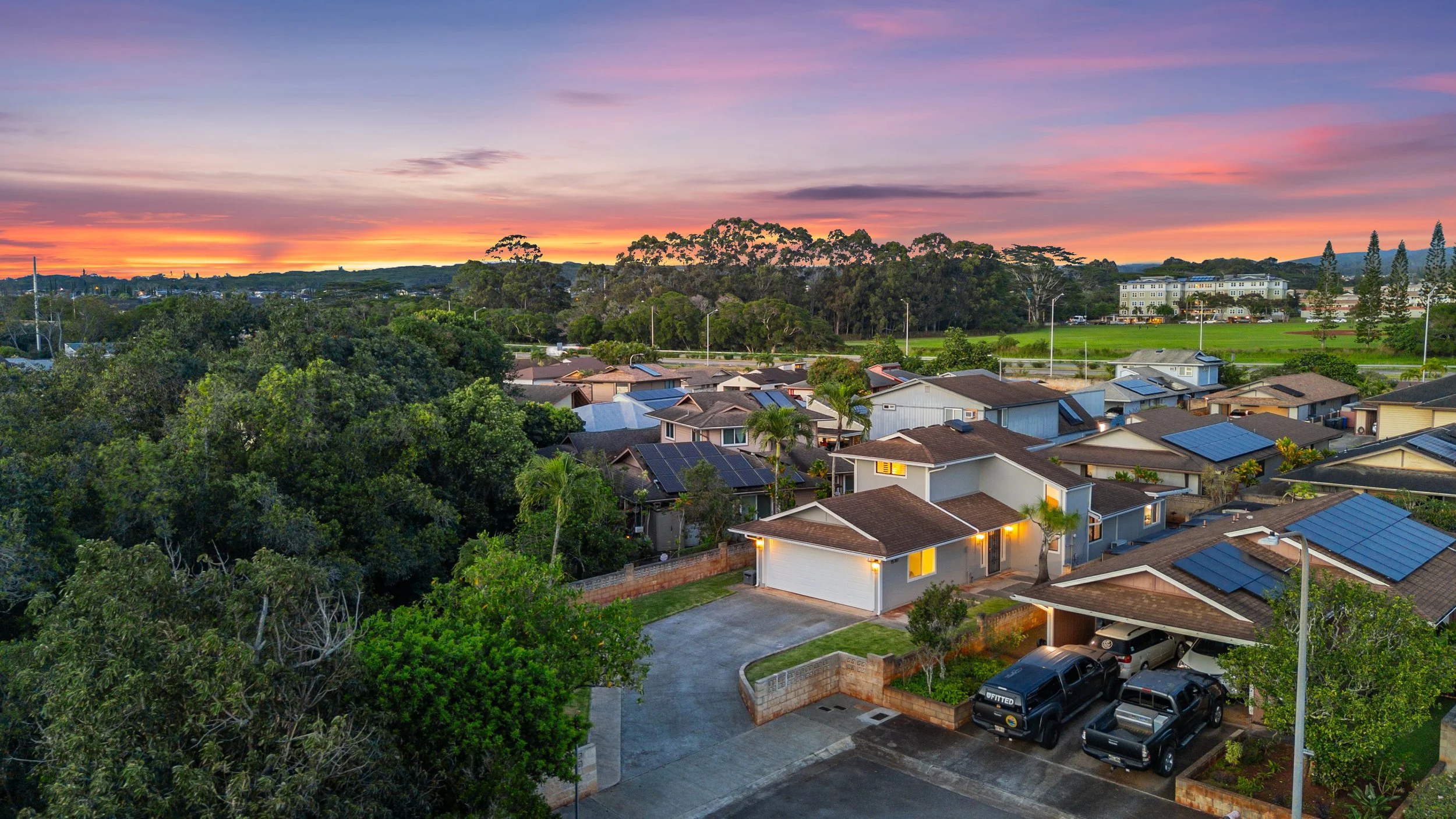 Aerial sunset view of Mililani Hawaii neighborhood near Schofield Barracks