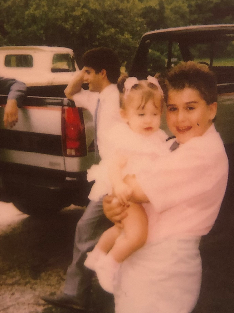 Ehasz family in front of a truck