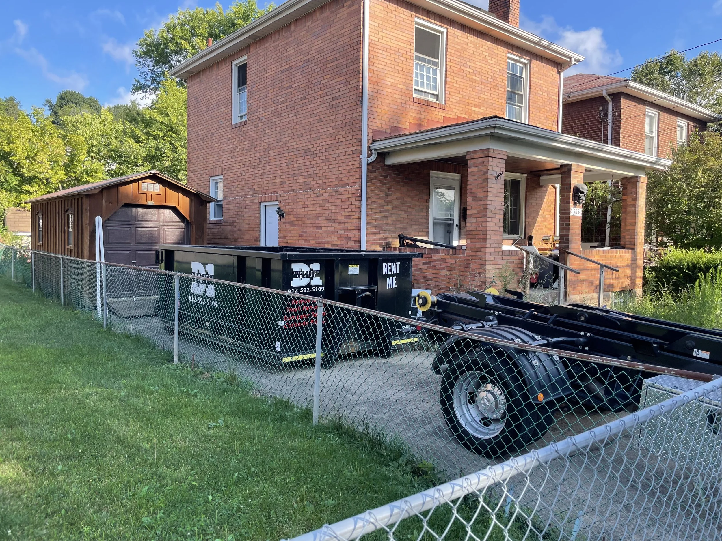 Tight space dumpster drop-off