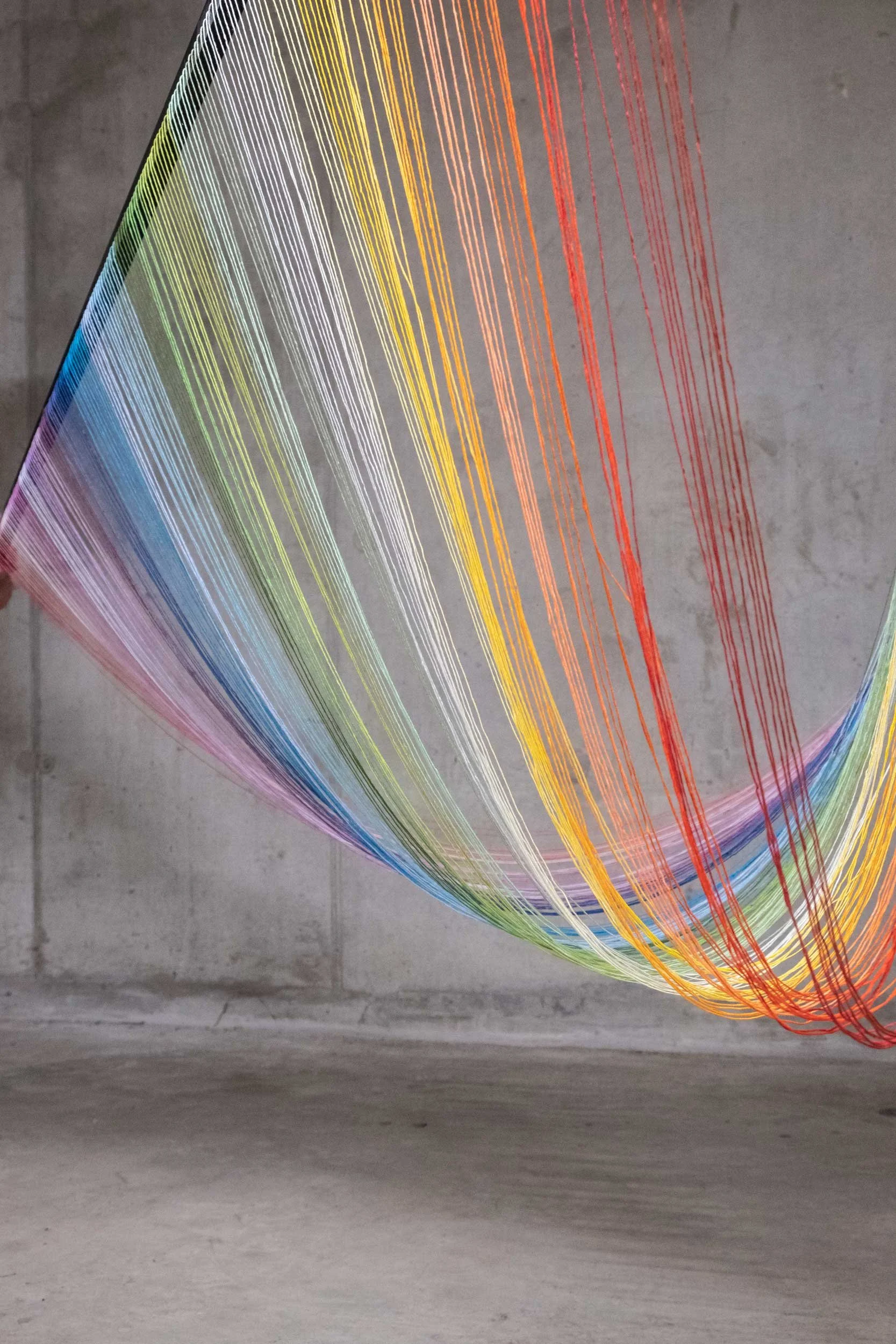 Colourful band of wool and thread