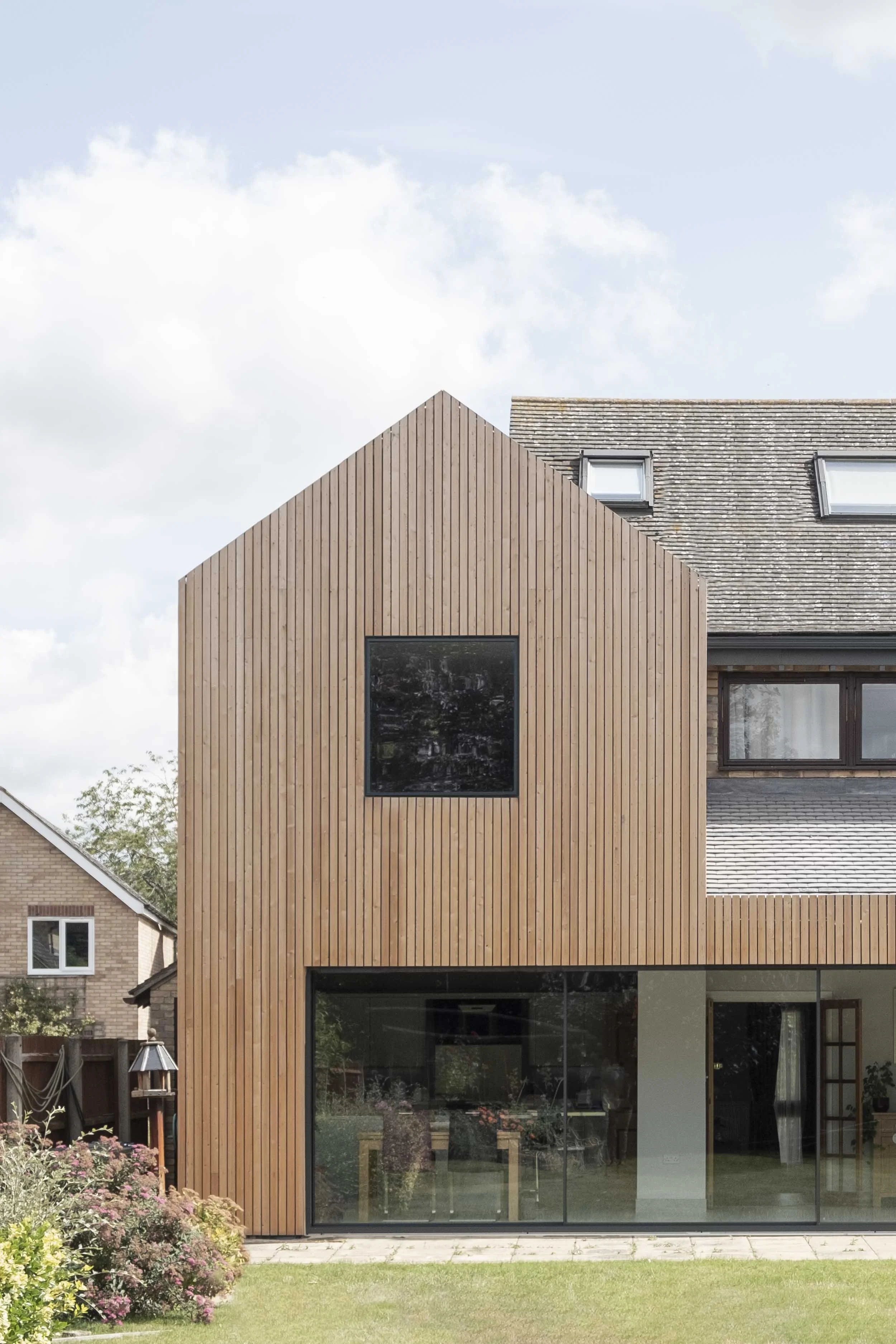 Inclume LTD — Contemporary timber house extension in Cambridge, creating a minimal and spacious detached family home with views to a landscaped garden.
