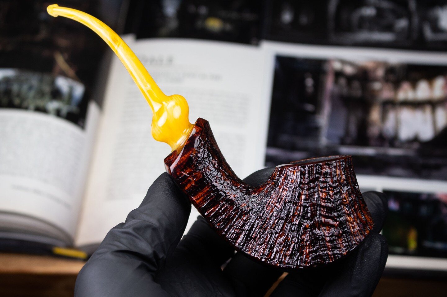 Japanese influenced half-bent volcano with antique bakelite.

This pipe was a whole lot of interesting to make. The fusion of smooth panels, contrast blasted ring grain, and asymmetrical ovoid stem form all take time and effort to harmonize, but they