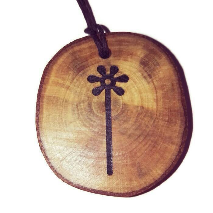 Embrace the beauty of nature with this stunning Flower Nazca Lines Geoglyph Engraved Personalised Necklace from Retrosheep. Handmade with natural wood, this pendant can be cut to size for the perfect fit and personalised to make it truly one-of-a-kin