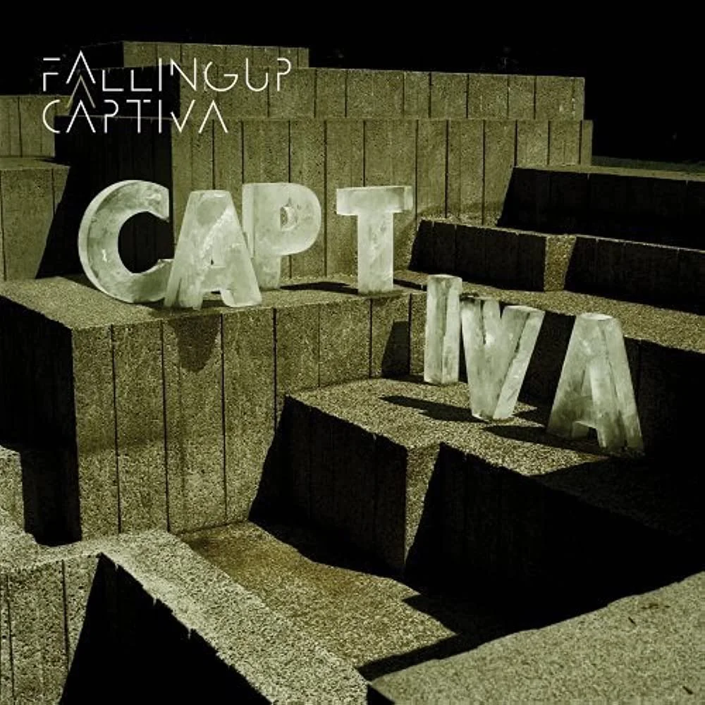 Album cover for Captiva by Falling Up, featuring serene and ethereal artwork that complements the album's atmospheric blend of ambient, electronic, and alternative rock soundscapes.