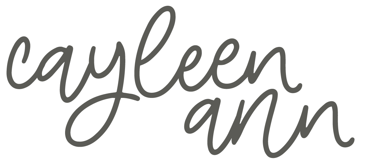 Stylized cursive text that reads 'caylen ann' in gray font.