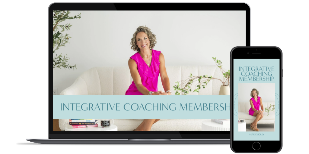 A woman in a bright pink dress sitting on a beige couch, smiling, with a white background and green plants. The laptop screen displays the text "Integrative Coaching Membership" with the same woman, and the smartphone shows the same image and text.