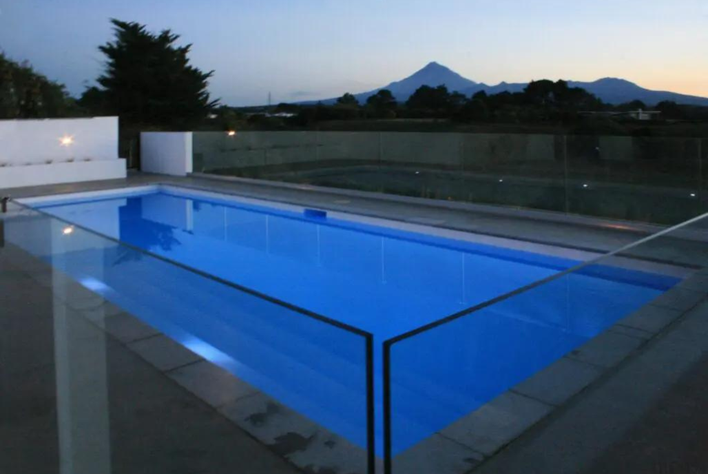 Glass pool fencing provides uninterrupted mountain views — Mayfair ...