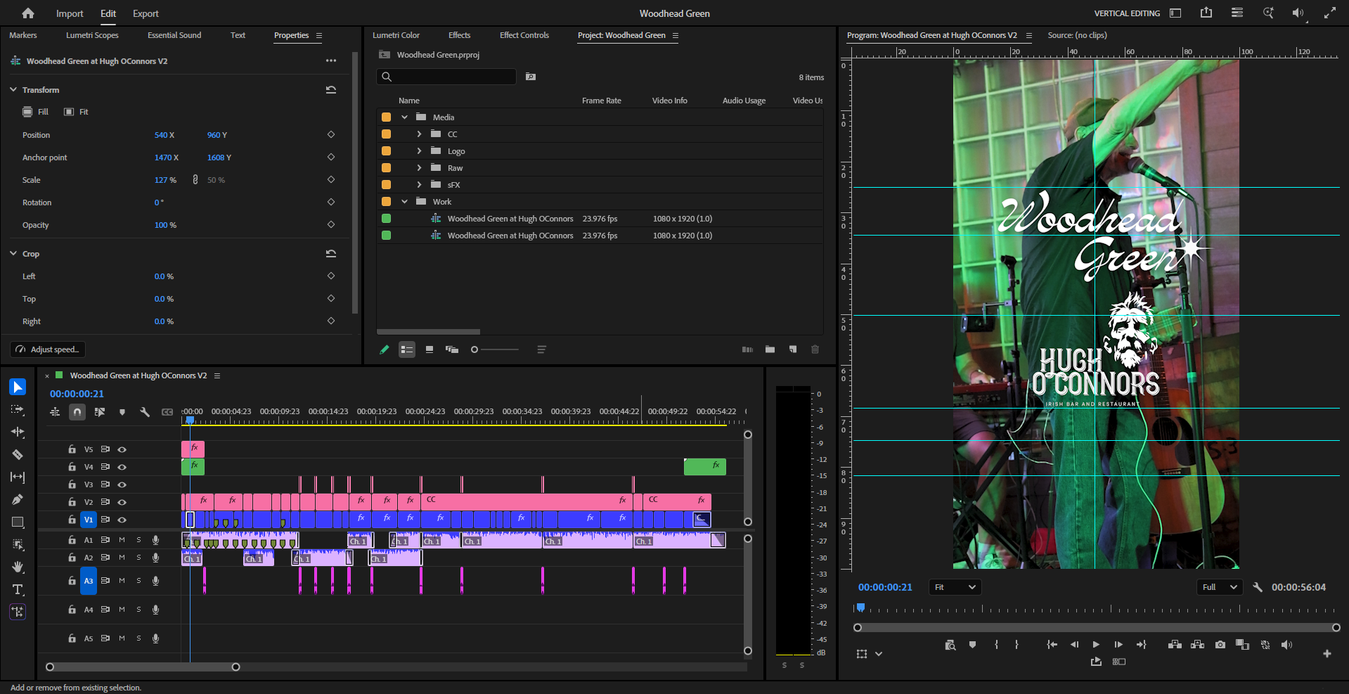 A video editing software interface displaying a project titled 'Woodhead Green at Hugh O'Connors V2'. The main preview shows a person singing into a microphone with green stage lighting, and text overlay reading 'Woodhead Green' and 'Hugh O'Connors IRISH BAR AND RESTAURANT'. The timeline at the bottom contains multiple video and audio tracks with various clips and effects.