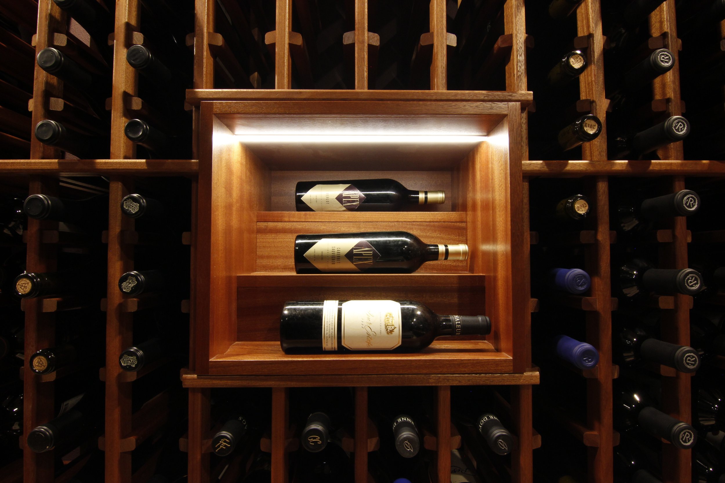 seattle_bellevue_woodinville_custom_custom_wine_cellar_design_sapele_ducted_cooling_rolling_ladder_glass_enclosure_5.jpg
