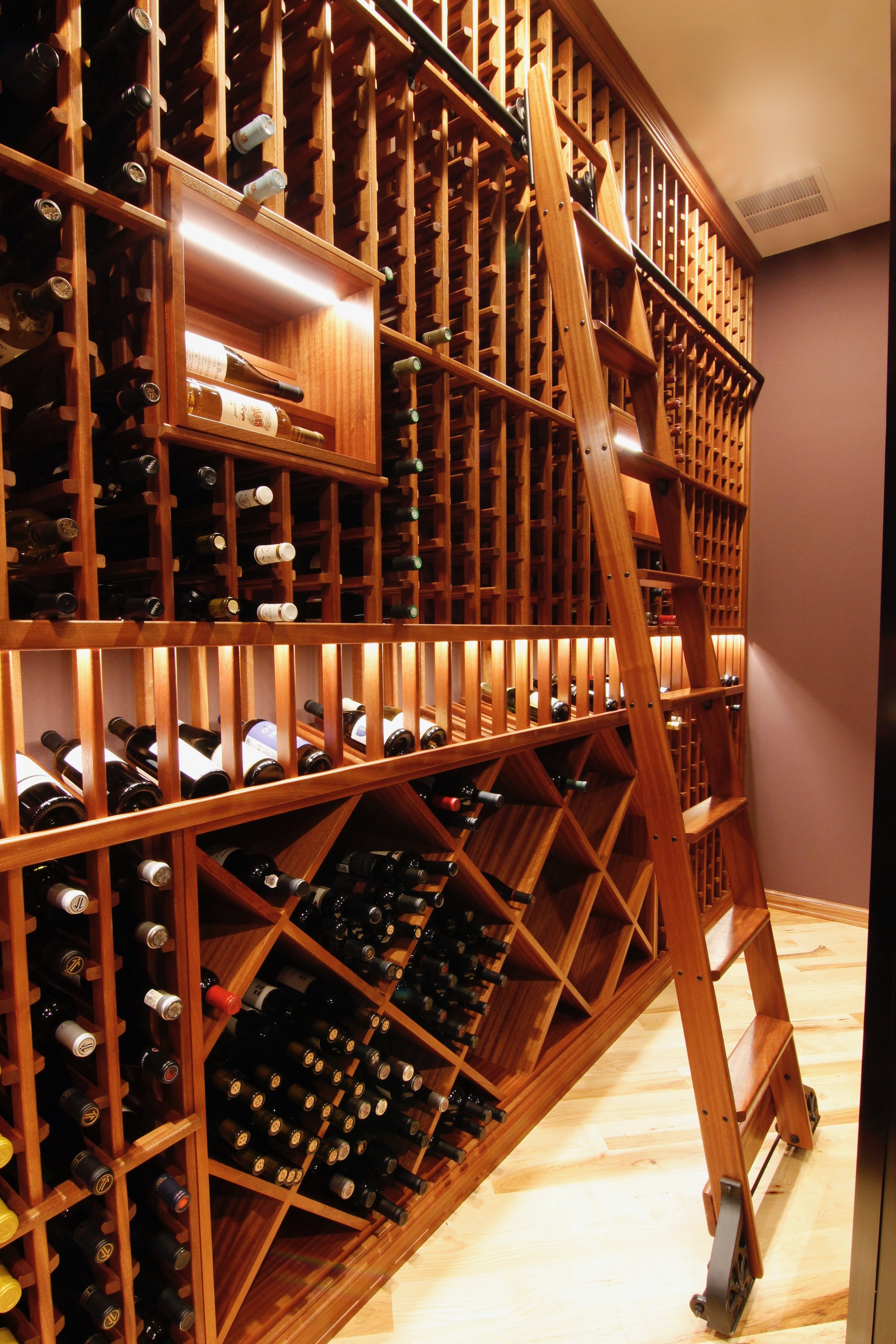 seattle_bellevue_woodinville_custom_custom_wine_cellar_design_sapele_ducted_cooling_rolling_ladder_glass_enclosure_7.jpg
