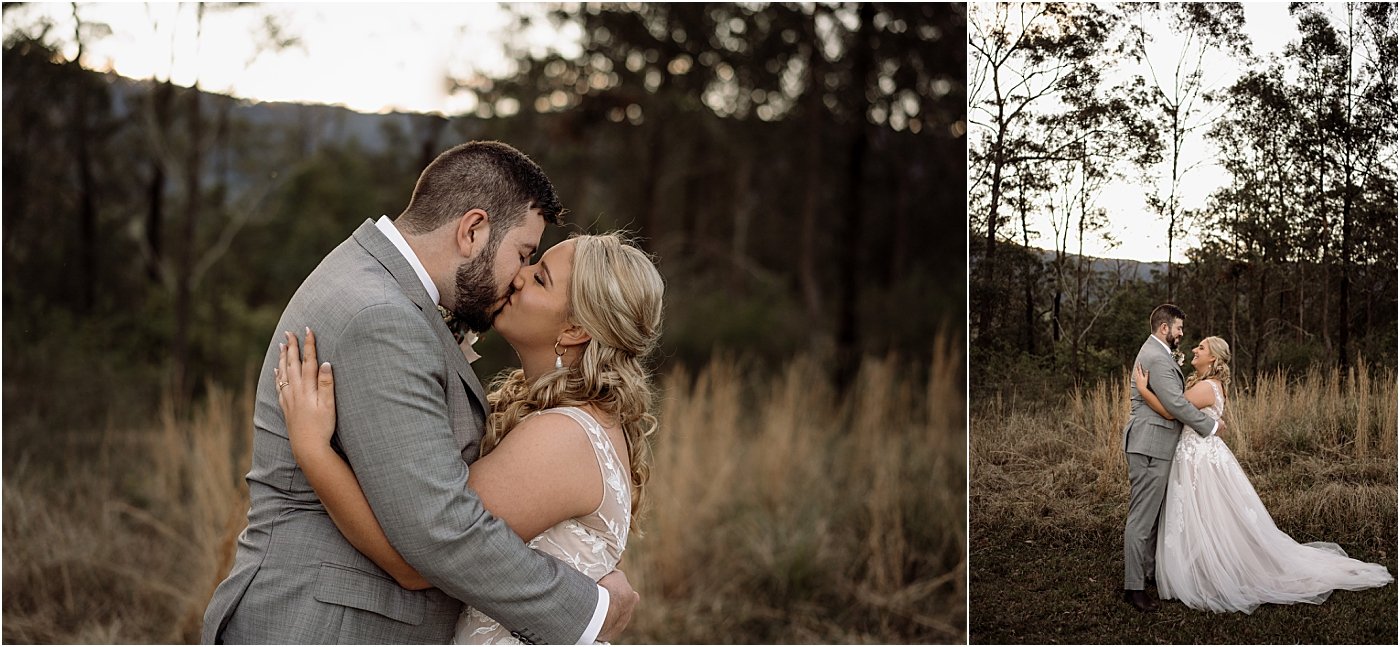 Bride and groom standing in an open field for a hug and a kiss at Riverwood Downs