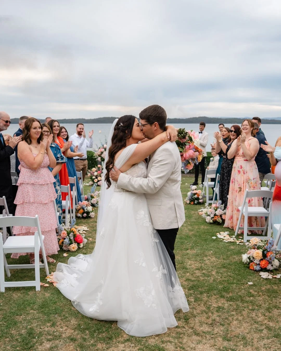 Sarah + Ryan
Officially hitched!!

We may have had cloudy skies, but those bright florals and the most bubbly bride on earth sure made up for that.
That beaming smile says it all :)

Congratulations, you two beautiful people.
You deserve all the happ