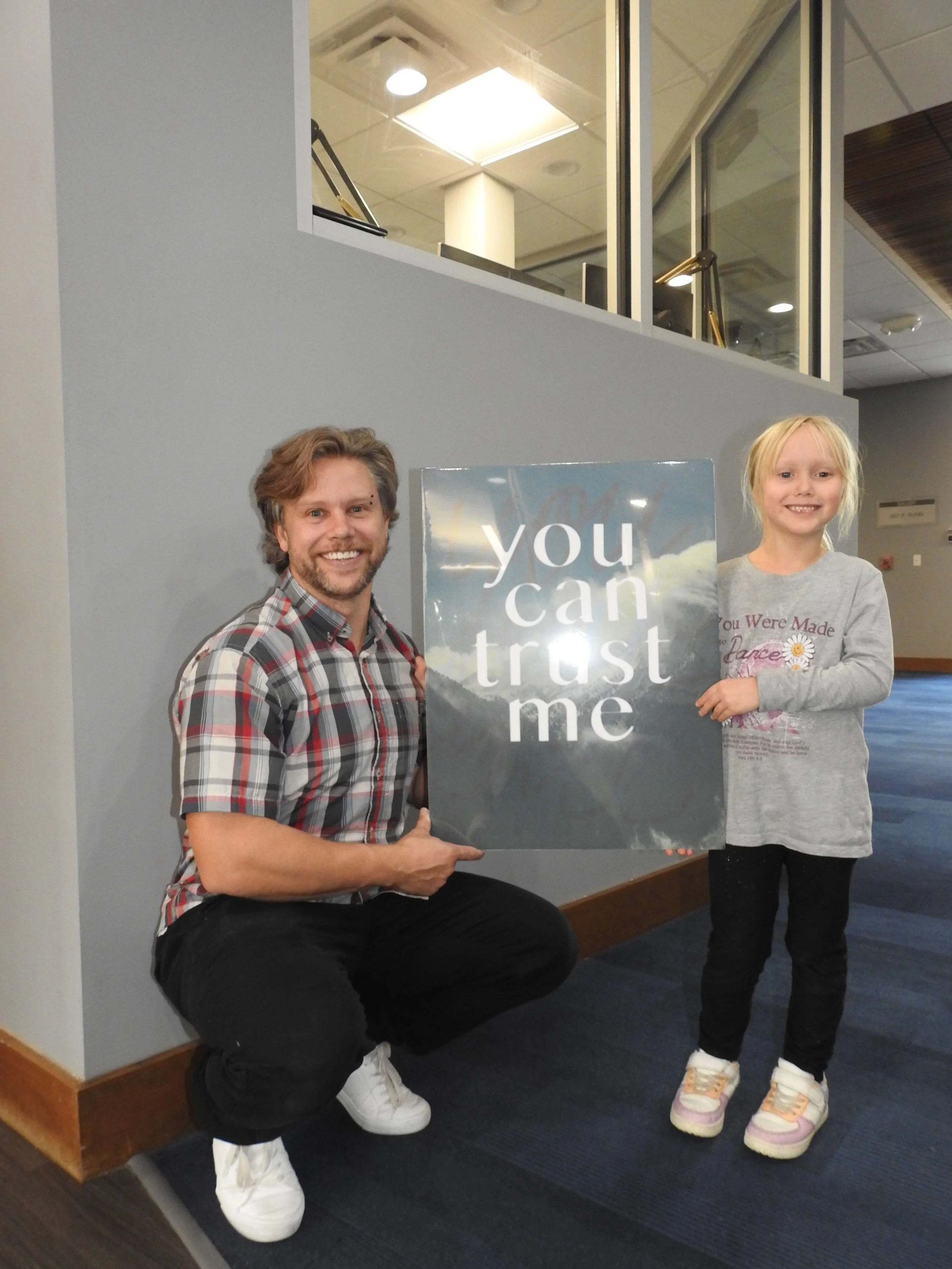 Nathan Hofer and daughter Gemma of South Dakota Public Broadcasting. Sioux Falls, South Dakota. 