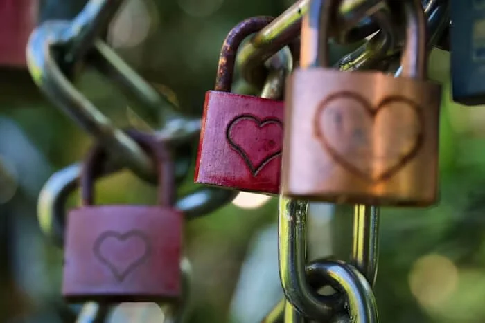 Locks with hearts on them representing attachment styles in relationships