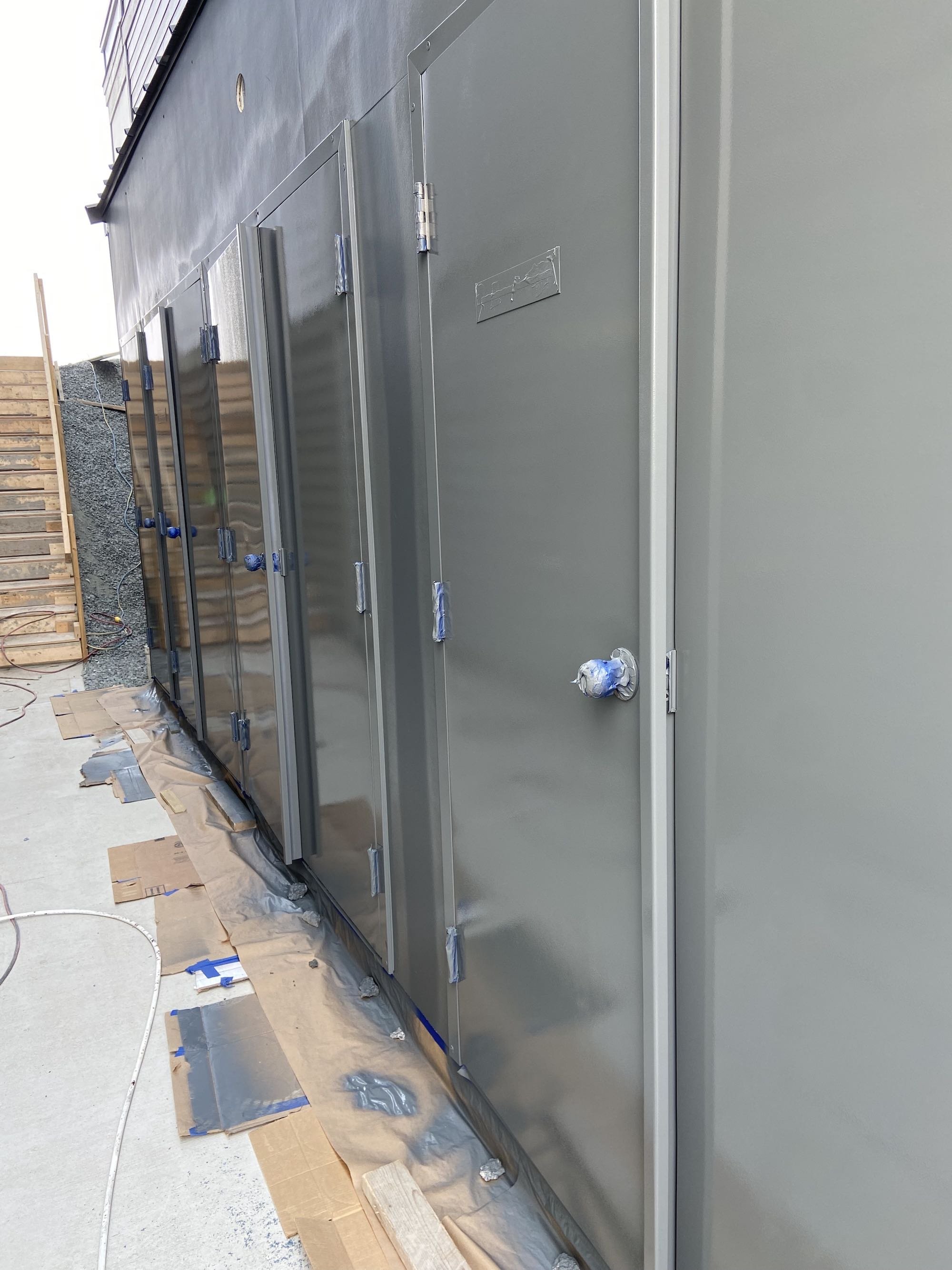 Chilliwack exterior metal doors spray painted