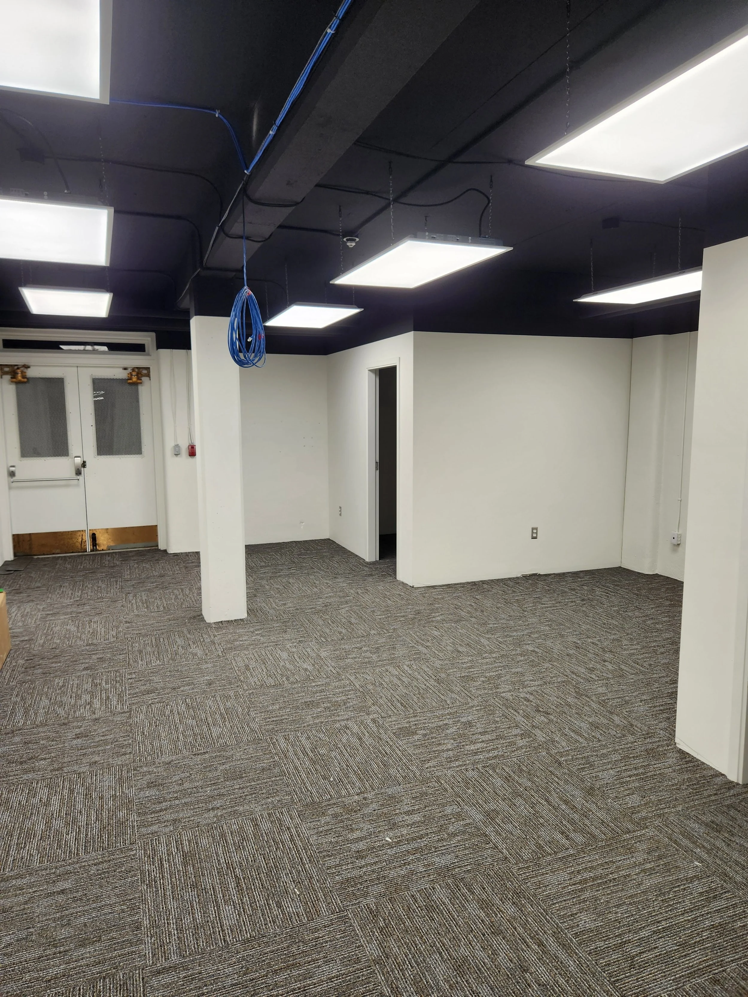 Chilliwack white and black commercial office repaint with exterior white painted steel door