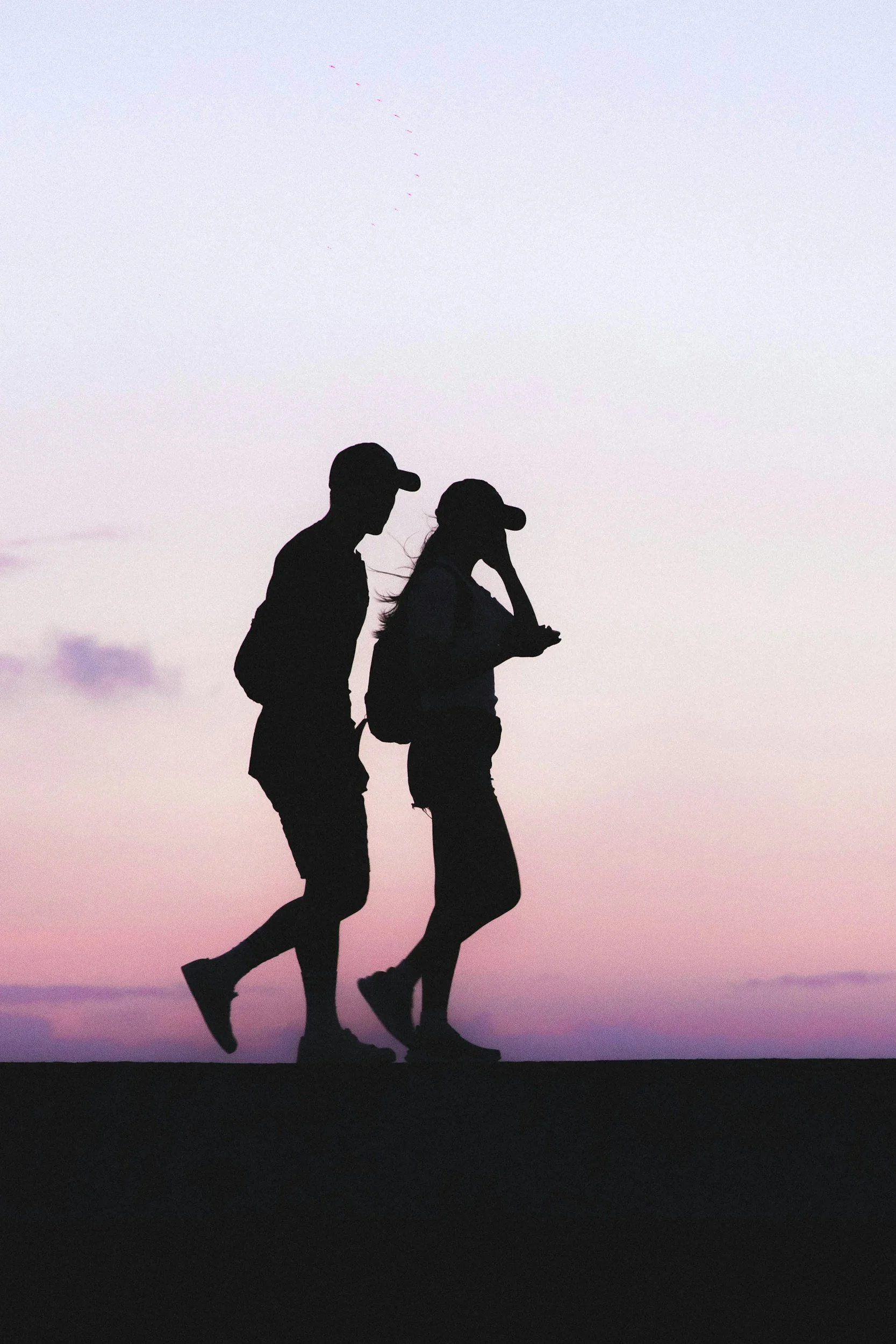 Couple navigating an unfamiliar city together while traveling