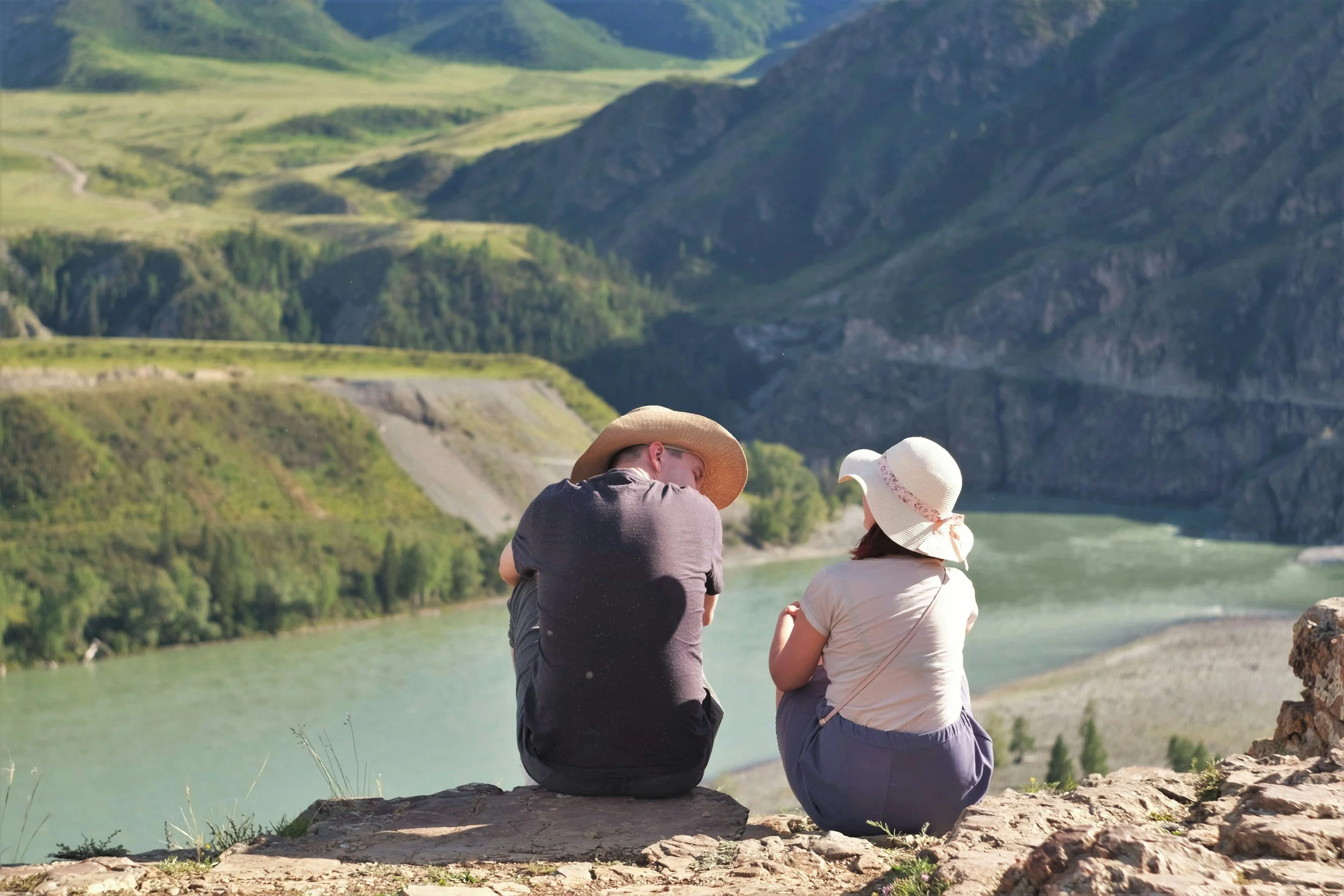 Couple having a calm, open conversation while traveling