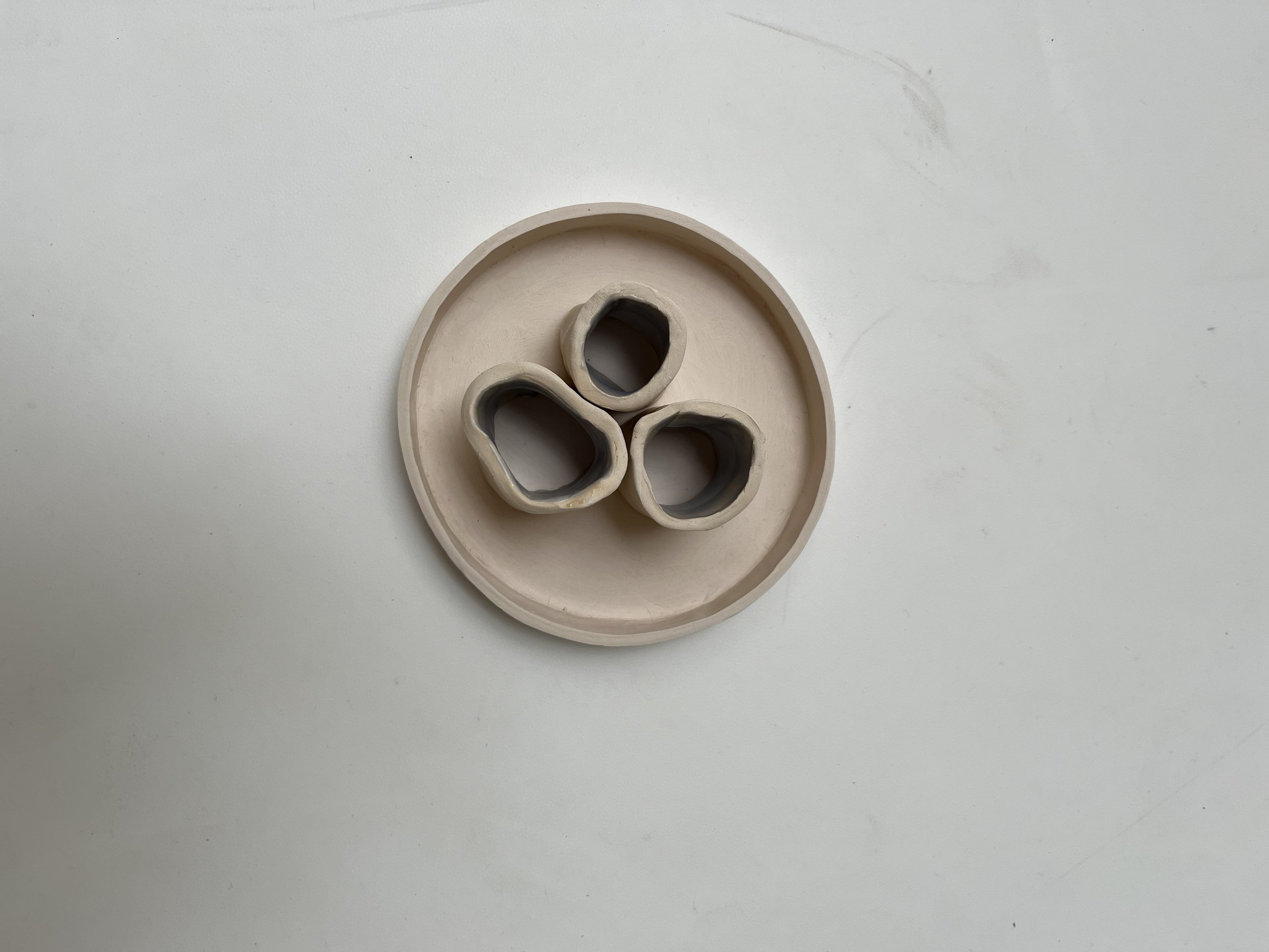 Within these three small shapes is more light seen than outside of these shapes ( look at the bottom of the three shapes compared to the bigger circular shape). This interests me a lot. I am currently working on objects that breath the light within.